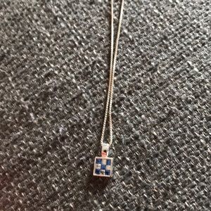 Silver necklace with blue and white sparkles